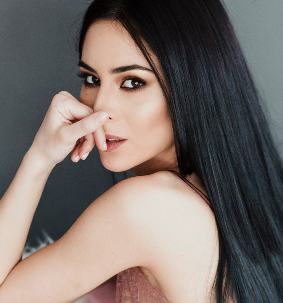 Attractive Woman resting chin on hand